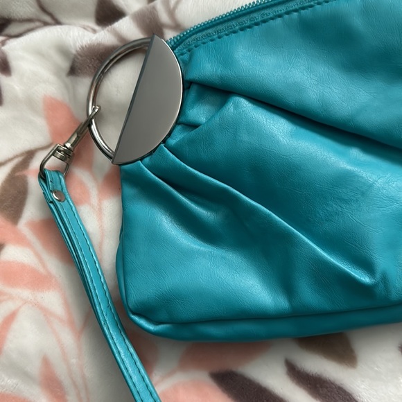 Turquoise Coin Pouch (Vinyl type Material) Interior has a zipper pouch area - Picture 9 of 11